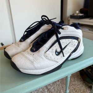 Nike White and Navy basketball shoes,  size 8, good condition.
